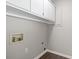 Laundry area with cabinets and hookups for washer and dryer at 2183 Highway 544, Conway, SC 29526