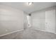 Simple bedroom with grey carpet, a closet and access to a full bathroom at 2183 Highway 544, Conway, SC 29526