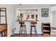 Small galley kitchen with black appliances and granite countertop at 1100 Possum Trot Rd. # C-101, North Myrtle Beach, SC 29582