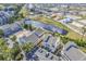 Aerial view of community near pond with tennis courts at 1100 Possum Trot Rd. # C-101, North Myrtle Beach, SC 29582