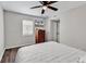 Bedroom featuring a TV, dresser, and ceiling fan at 1100 Possum Trot Rd. # C-101, North Myrtle Beach, SC 29582