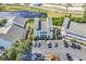 Aerial view of community with parking and pond at 1100 Possum Trot Rd. # C-101, North Myrtle Beach, SC 29582