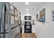 Efficient kitchen with black appliances and white cabinets at 1100 Possum Trot Rd. # C-101, North Myrtle Beach, SC 29582