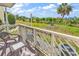 Relaxing balcony with outdoor seating and views of the surrounding area at 1100 Possum Trot Rd. # C-101, North Myrtle Beach, SC 29582