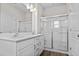 Bathroom features double vanity, large mirror, and shower at 3059 Deerberry Place, Longs, SC 29568