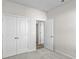 Bedroom with double doors to closet and access to hallway at 3059 Deerberry Place, Longs, SC 29568