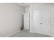 Bedroom with double doors to closet and access to bathroom at 3059 Deerberry Place, Longs, SC 29568
