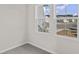 Bedroom with two windows and grey carpet, offering natural light at 3059 Deerberry Place, Longs, SC 29568