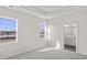 Spacious bedroom with two windows, carpet, and en-suite bathroom at 3059 Deerberry Place, Longs, SC 29568