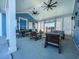 Relaxing community pool with lounge chairs and covered seating area at 3059 Deerberry Place, Longs, SC 29568
