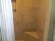 Clean bathroom with a tiled shower and built-in seat at 3922 Spruce Dr. # 3922, Myrtle Beach, SC 29577