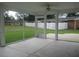 Spacious screened porch with ceiling fan and concrete floor at 3922 Spruce Dr. # 3922, Myrtle Beach, SC 29577