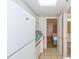 Small kitchen with white appliances and teal countertops at 2207 S Ocean Blvd. # 1516, Myrtle Beach, SC 29577