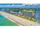 Aerial view of oceanfront high-rise building and beach at 2207 S Ocean Blvd. # 1516, Myrtle Beach, SC 29577