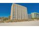 Multi-story oceanfront resort building with balconies and beach access at 1207 S Ocean Blvd. # 50606, Myrtle Beach, SC 29577
