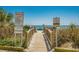 Beach access walkway with boardwalk and social distancing signs at 1207 S Ocean Blvd. # 50411, Myrtle Beach, SC 29577