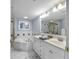 Bathroom with double vanity, soaking tub, and shower at 669 Retreat Beach Circle # C2G, Pawleys Island, SC 29585