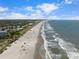 Aerial view of beach and oceanfront community at 669 Retreat Beach Circle # C2G, Pawleys Island, SC 29585