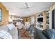 Spacious living area showcasing comfortable seating and views into the kitchen at 669 Retreat Beach Circle # C2G, Pawleys Island, SC 29585
