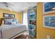 Bedroom with a full bed and unique bookshelf at 669 Retreat Beach Circle # C2G, Pawleys Island, SC 29585