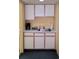 Small kitchenette with sink, microwave, and coffee maker at 2701 S Ocean Blvd. # 310, North Myrtle Beach, SC 29582
