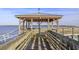 Covered wooden gazebo on a pier offering scenic views at 844 Commanders Island Rd., Georgetown, SC 29440