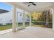 Relaxing screened porch with ceiling fan overlooking backyard at 844 Commanders Island Rd., Georgetown, SC 29440