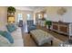 Living room with hardwood floors, comfortable seating, and open floor plan at 2810 Cook Circle # D, Myrtle Beach, SC 29577