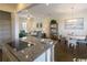 Open kitchen with a large island and view into living area at 2810 Cook Circle # D, Myrtle Beach, SC 29577