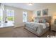 Comfortable main bedroom with a king-size bed and plenty of light at 2810 Cook Circle # D, Myrtle Beach, SC 29577