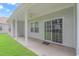 Covered back patio with sliding glass doors at 1616 Sapphire Dr., Longs, SC 29568