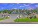 Charming one-story house with a white garage door and manicured lawn at 1616 Sapphire Dr., Longs, SC 29568