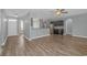 Open living room and kitchen with hardwood floors at 1616 Sapphire Dr., Longs, SC 29568