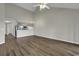 Open living area with vaulted ceilings and hardwood-style flooring at 5040 Windsor Green Way # 302, Myrtle Beach, SC 29579