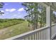 Enjoy the view from this screened porch, overlooking a beautiful landscape at 5040 Windsor Green Way # 302, Myrtle Beach, SC 29579