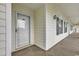 Private condo entrance with a covered walkway at 5040 Windsor Green Way # 302, Myrtle Beach, SC 29579