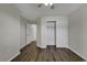 Spacious bedroom with large closet and wood-look floors at 5040 Windsor Green Way # 302, Myrtle Beach, SC 29579