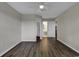 Spacious bedroom with wood-look floors and access to bathroom at 5040 Windsor Green Way # 302, Myrtle Beach, SC 29579