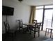 Dining area with table and four chairs at 1501 S Ocean Blvd. # 848, Myrtle Beach, SC 29577