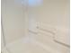 Clean white bathtub with a grab bar at 1501 S Ocean Blvd. # 848, Myrtle Beach, SC 29577
