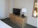 Bedroom with dresser, TV, and ample storage at 1501 S Ocean Blvd. # 848, Myrtle Beach, SC 29577