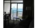 Ocean view from living room with balcony access at 1501 S Ocean Blvd. # 848, Myrtle Beach, SC 29577