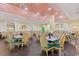 Bright dining room with wicker chairs and pink ceiling at 1501 S Ocean Blvd. # 848, Myrtle Beach, SC 29577