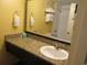 Bathroom with sink, granite countertop, and mirror at 1501 S Ocean Blvd. # 1020, Myrtle Beach, SC 29577