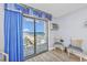 Living room with ocean view and balcony access at `1207 S Ocean Blvd. # 51512, Myrtle Beach, SC 29577
