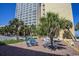 Brick patio with picnic table and lounge chairs at `1207 S Ocean Blvd. # 51512, Myrtle Beach, SC 29577