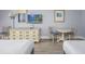 Two twin beds, dresser, and small table with chairs in a bright bedroom at `1207 S Ocean Blvd. # 51512, Myrtle Beach, SC 29577