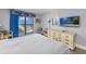 Bedroom with ocean view, dresser, and TV at `1207 S Ocean Blvd. # 51512, Myrtle Beach, SC 29577