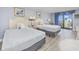 Bedroom with two beds and ocean view at `1207 S Ocean Blvd. # 51512, Myrtle Beach, SC 29577