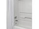 White bathtub and shower with white shower curtain at `1207 S Ocean Blvd. # 51512, Myrtle Beach, SC 29577